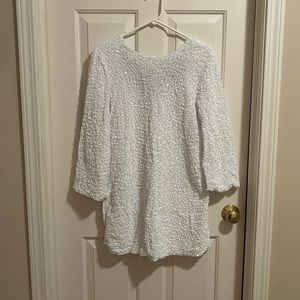 White Sequins long sleeve dress with big black bow on the back